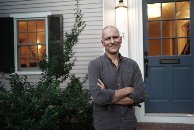 Moungi Bawendi, the Lester Wolfe Professor of Chemistry at MIT, photographed in front of his home. (Photo: Jodi Hilton)